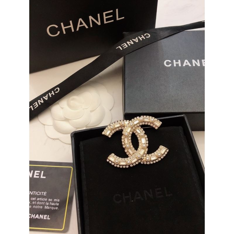 Ch*el brooches